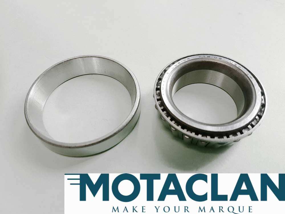 Differential output shaft bearing